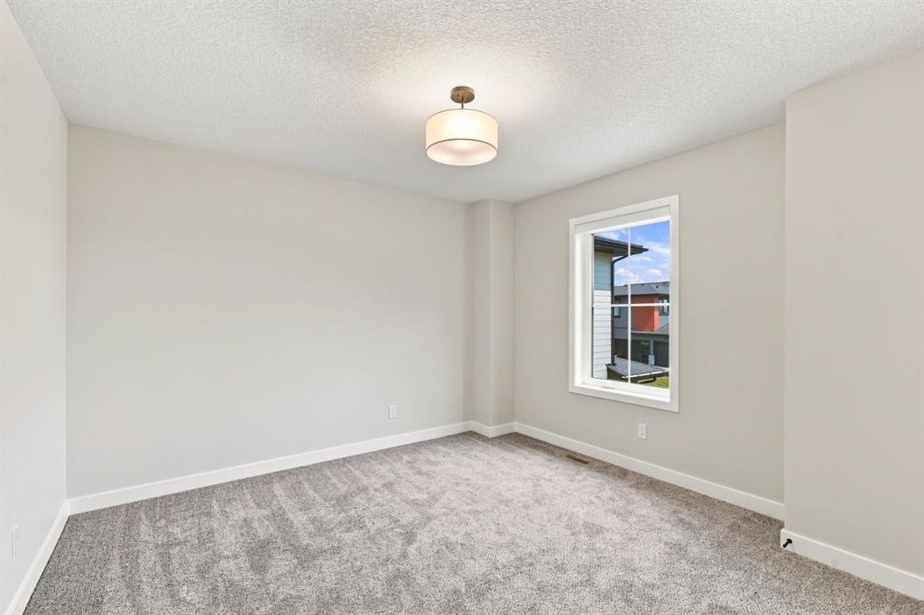 40 Fieldstone Close, Balzac, AB - Indoor Photo Showing Other Room
