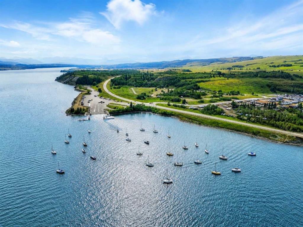 35 Cottageclub Lane, Rural Rocky View County, AB - Outdoor With Body Of Water With View