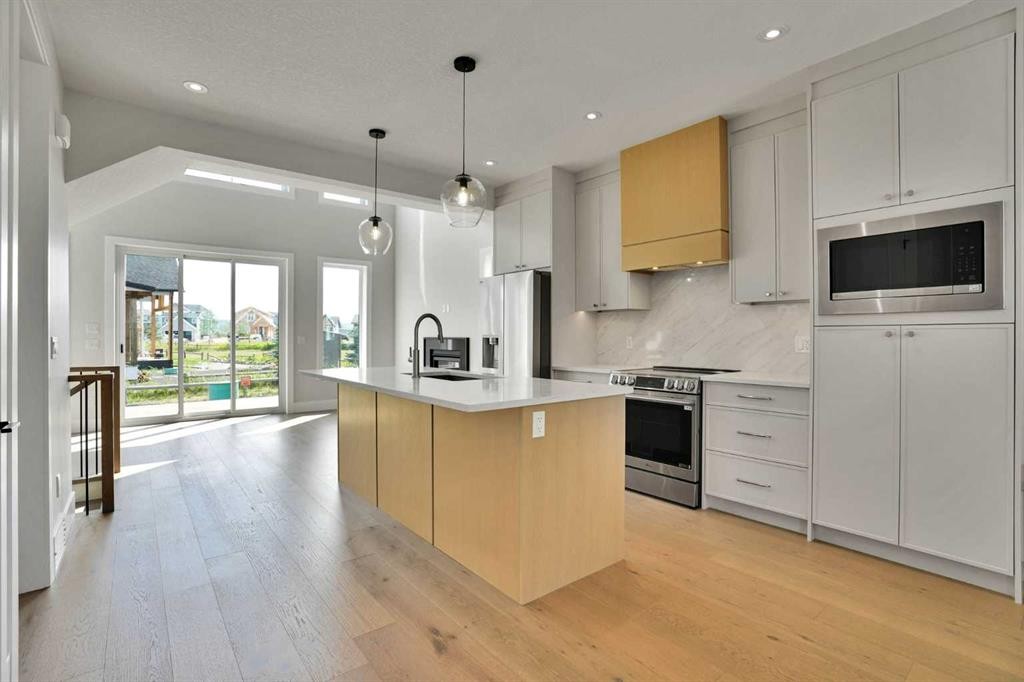 35 Cottageclub Lane, Rural Rocky View County, AB - Indoor Photo Showing Kitchen With Upgraded Kitchen