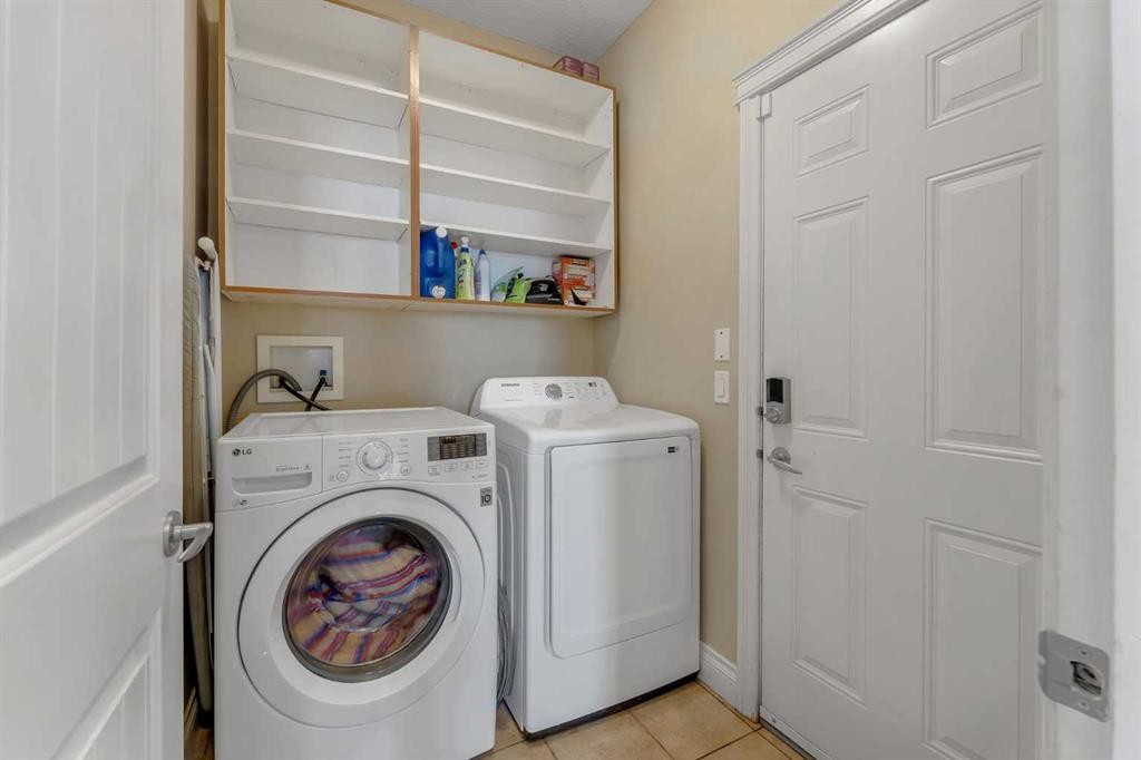 134 Channelside Cove Sw, Airdrie, AB - Indoor Photo Showing Laundry Room