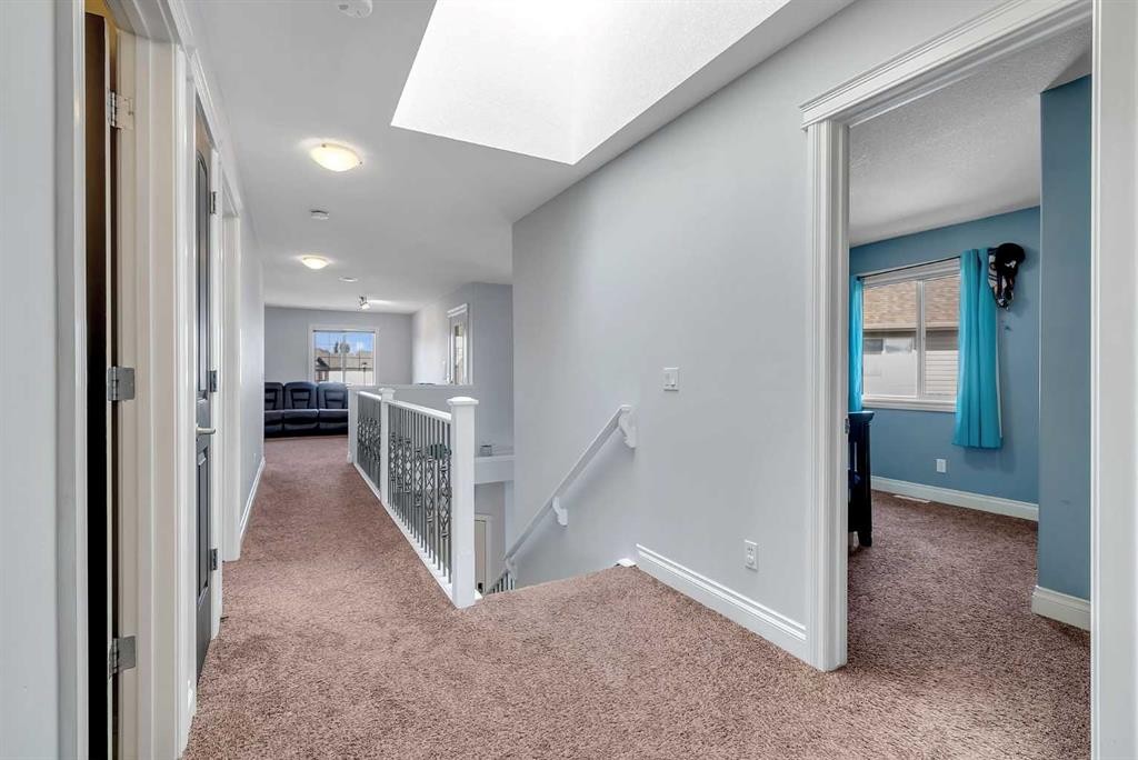 134 Channelside Cove Sw, Airdrie, AB - Indoor Photo Showing Other Room