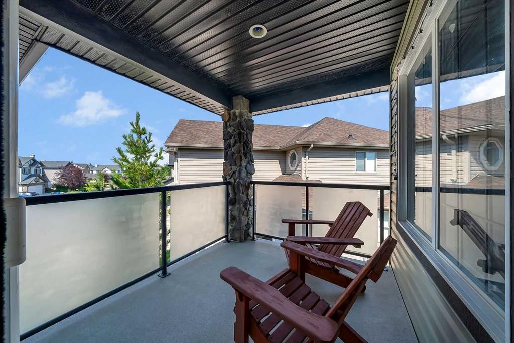 134 Channelside Cove Sw, Airdrie, AB - Outdoor With Deck Patio Veranda With Exterior