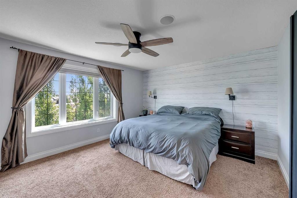 134 Channelside Cove Sw, Airdrie, AB - Indoor Photo Showing Bedroom