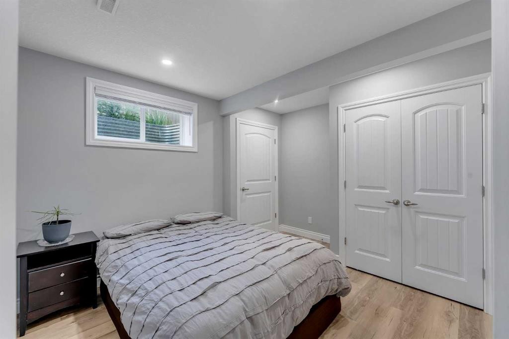 134 Channelside Cove Sw, Airdrie, AB - Indoor Photo Showing Bedroom