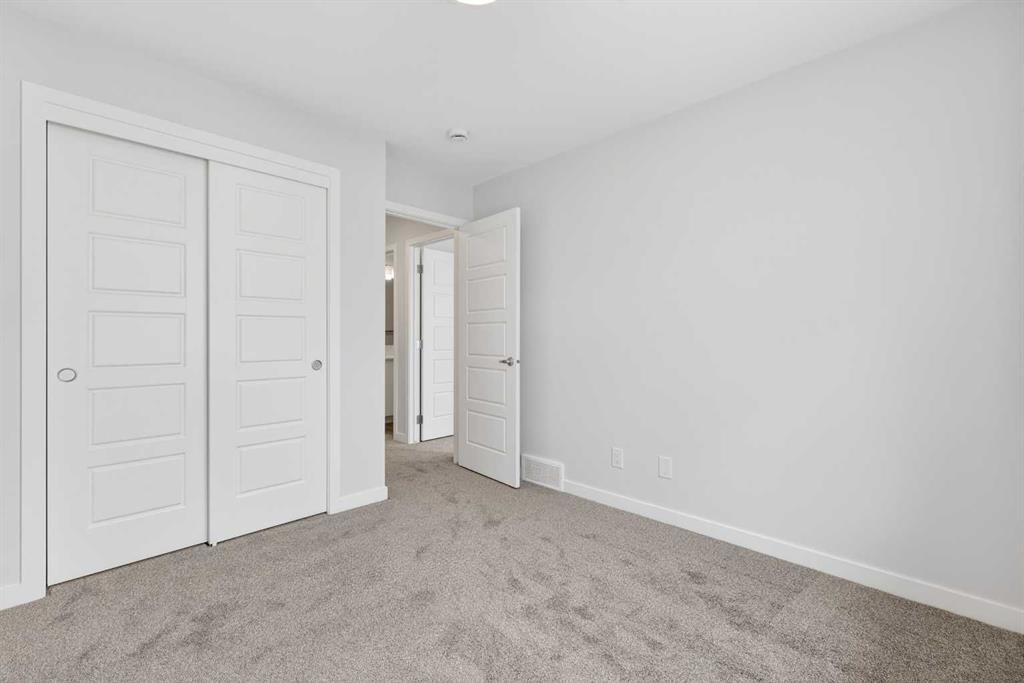 1027-132 Red Embers Link Ne, Calgary, AB - Indoor Photo Showing Other Room