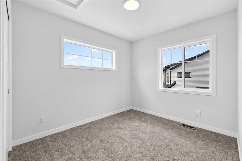 1027-132 Red Embers Link Ne, Calgary, AB - Indoor Photo Showing Other Room