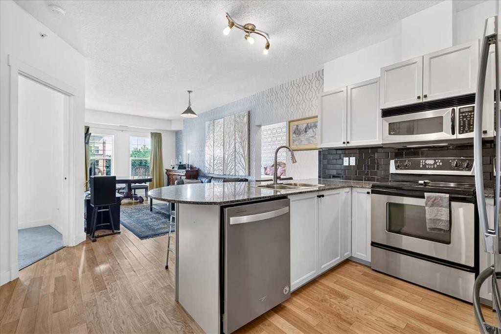 3404-11811 Lake Fraser Drive Se, Calgary, AB - Indoor Photo Showing Kitchen With Upgraded Kitchen