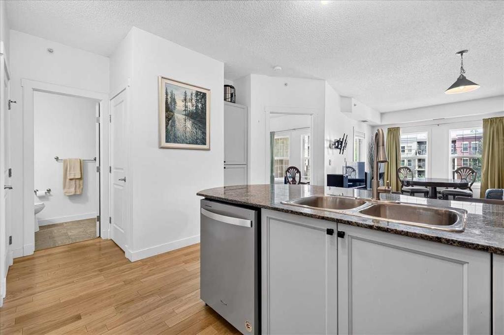 3404-11811 Lake Fraser Drive Se, Calgary, AB - Indoor Photo Showing Kitchen With Double Sink