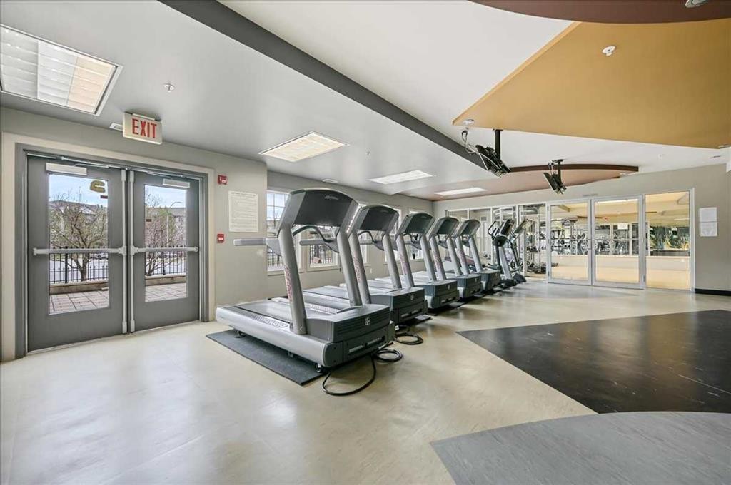 3404-11811 Lake Fraser Drive Se, Calgary, AB - Indoor Photo Showing Gym Room