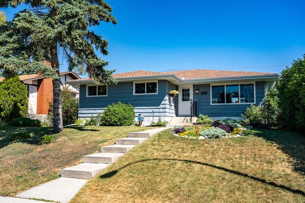 180 Huntford Road Ne, Calgary, AB - Outdoor With Facade
