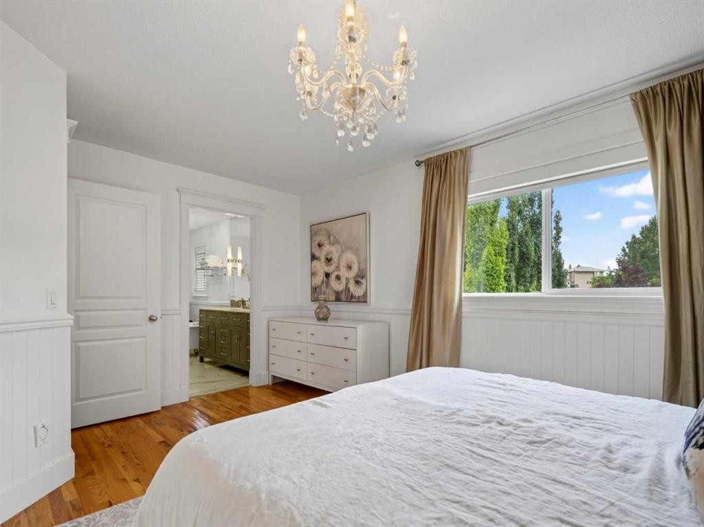 126 West Terrace Point, Cochrane, AB - Indoor Photo Showing Bedroom