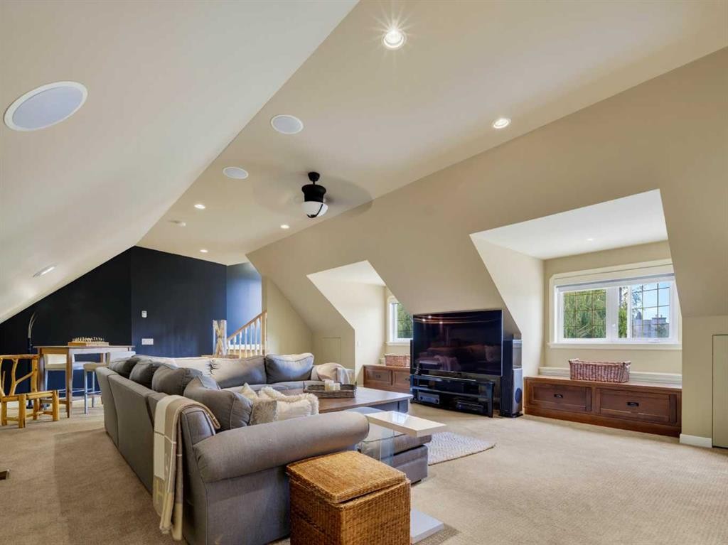 126 West Terrace Point, Cochrane, AB - Indoor Photo Showing Living Room With Fireplace