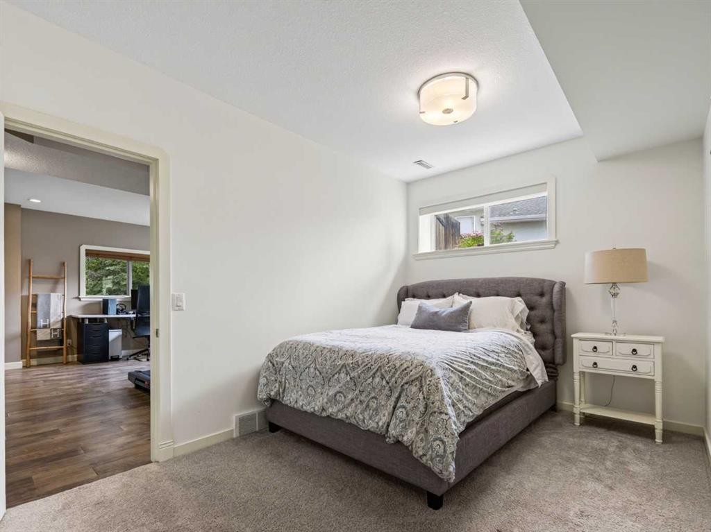 126 West Terrace Point, Cochrane, AB - Indoor Photo Showing Bedroom