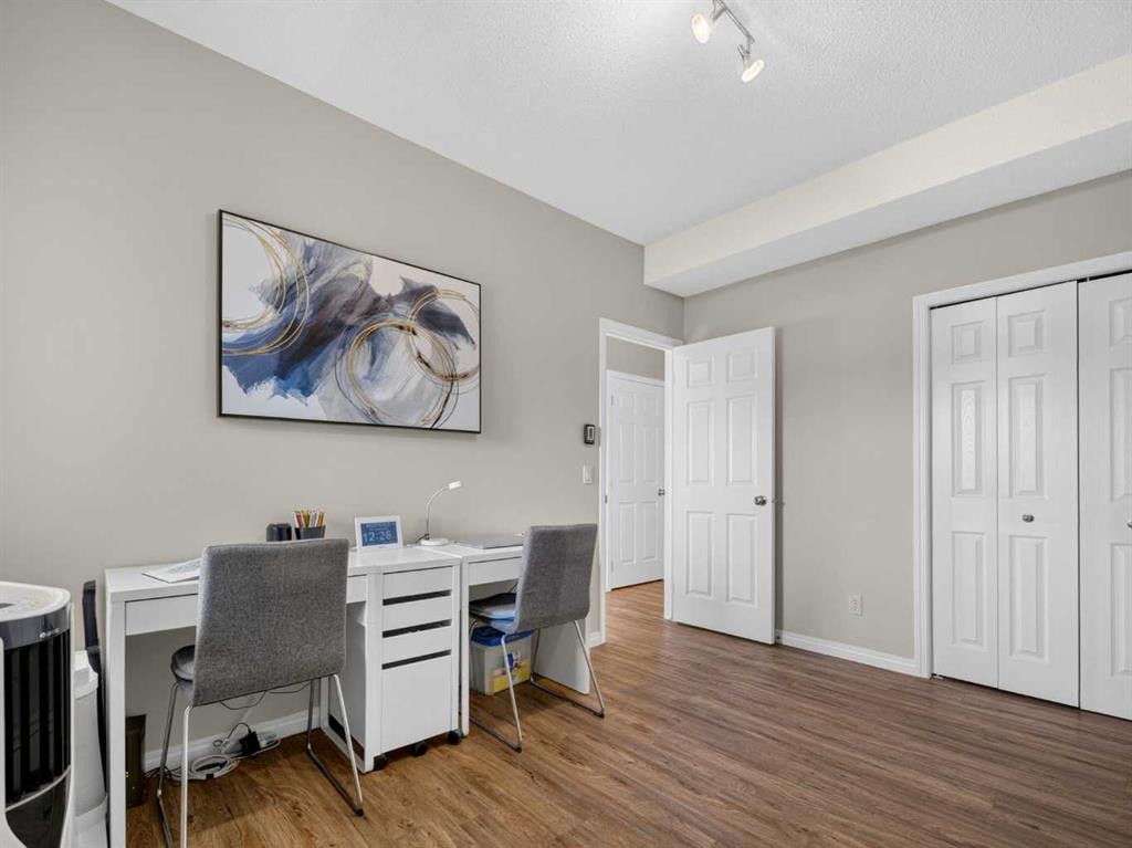 201-72 Quigley Drive, Cochrane, AB - Indoor Photo Showing Office