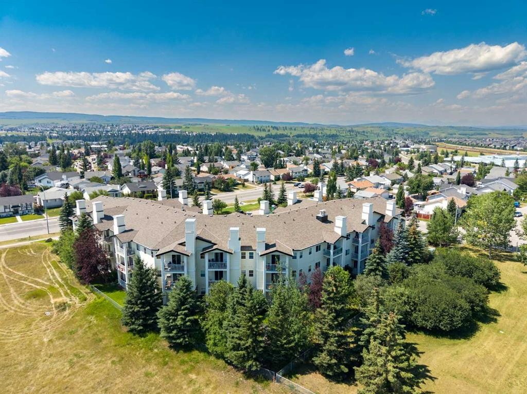 201-72 Quigley Drive, Cochrane, AB - Outdoor With View