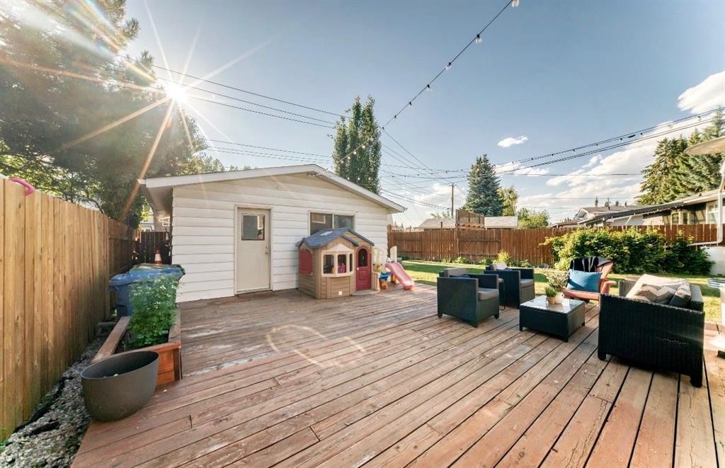 411 Woodland Crescent Se, Calgary, AB - Outdoor With Deck Patio Veranda With Exterior