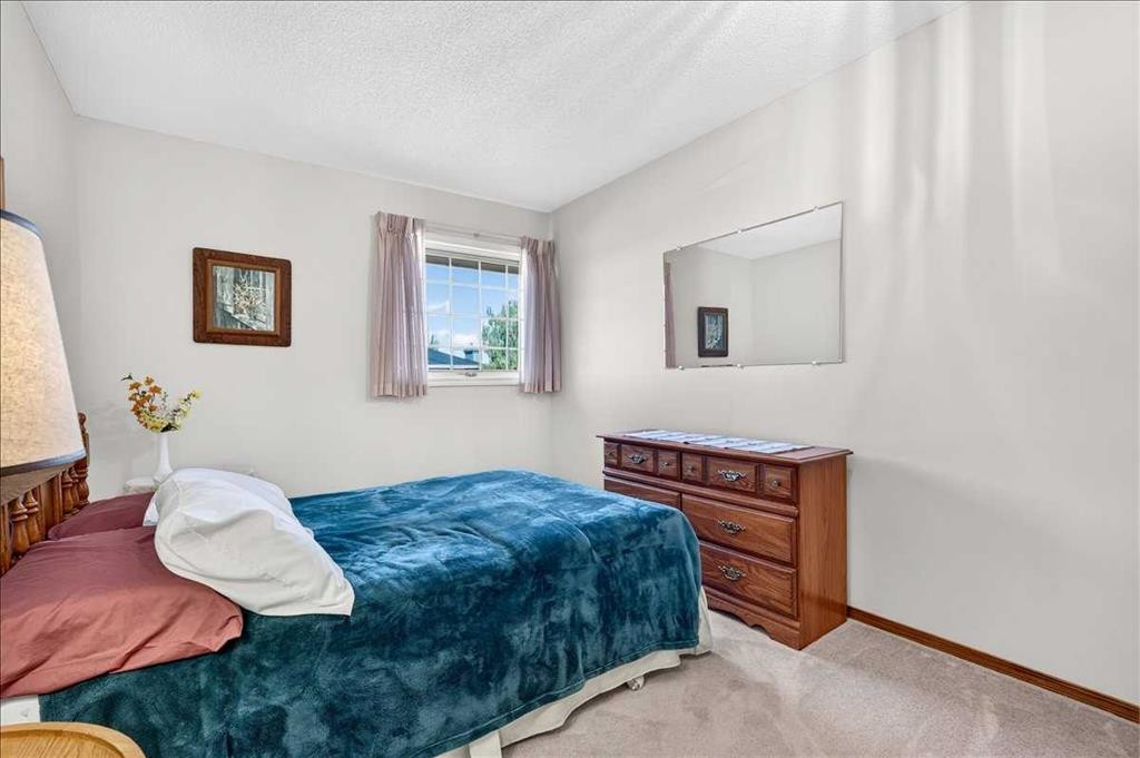 105 Christie Knoll Heights Sw, Calgary, AB - Indoor Photo Showing Bedroom