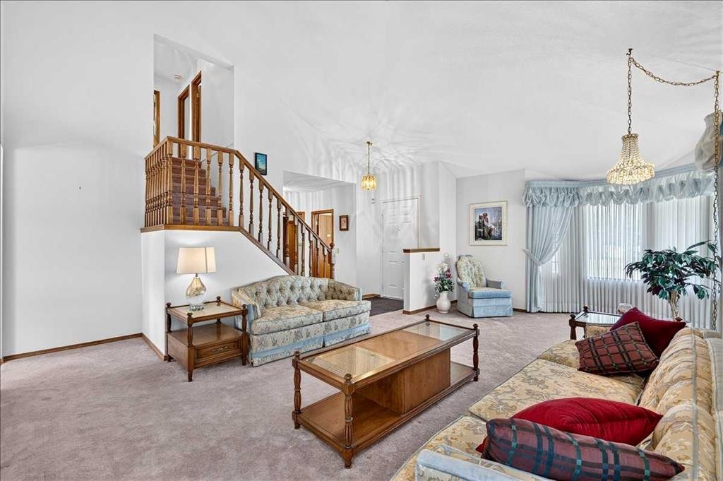 105 Christie Knoll Heights Sw, Calgary, AB - Indoor Photo Showing Living Room