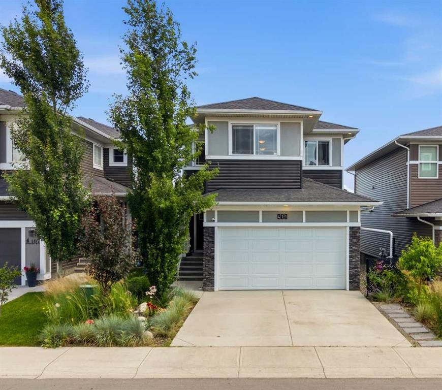 411 Rivercrest Boulevard, Cochrane, AB - Outdoor With Facade