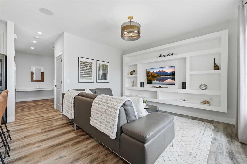 411 Rivercrest Boulevard, Cochrane, AB - Indoor Photo Showing Living Room