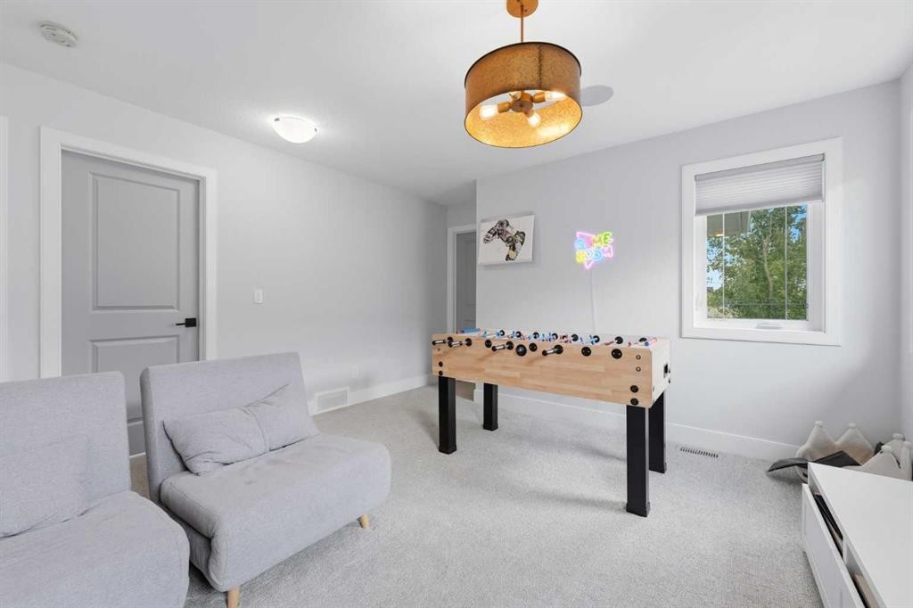 411 Rivercrest Boulevard, Cochrane, AB - Indoor Photo Showing Other Room