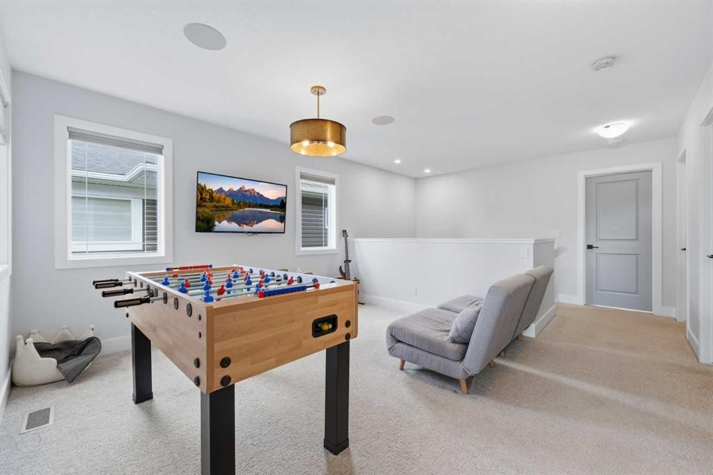 411 Rivercrest Boulevard, Cochrane, AB - Indoor Photo Showing Other Room