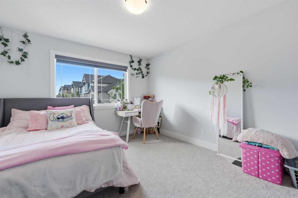 411 Rivercrest Boulevard, Cochrane, AB - Indoor Photo Showing Bedroom