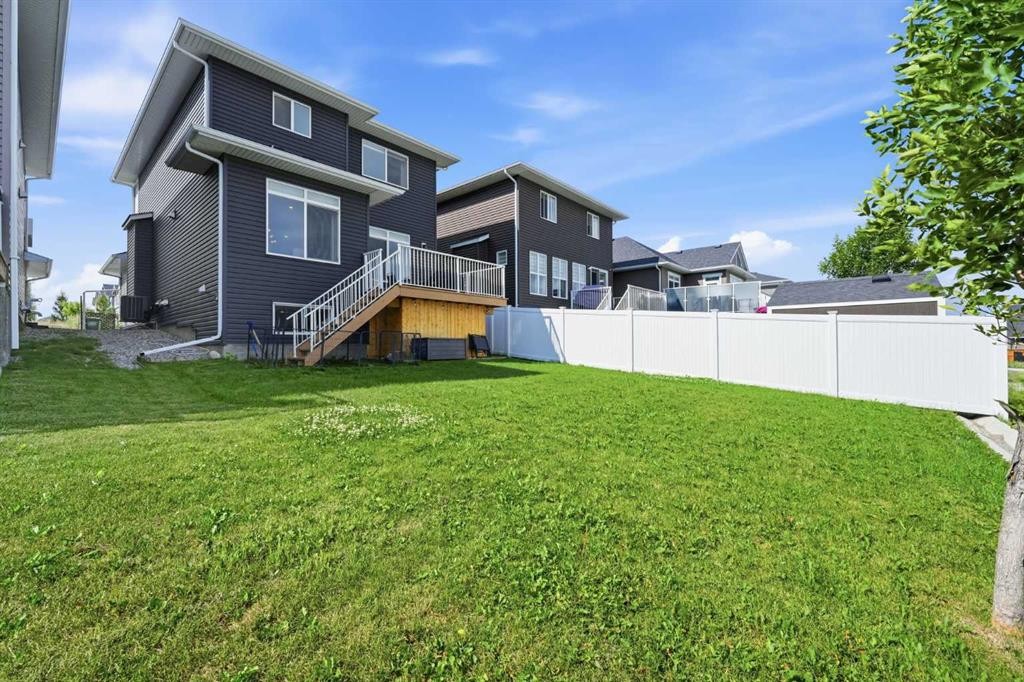 411 Rivercrest Boulevard, Cochrane, AB - Outdoor With Deck Patio Veranda