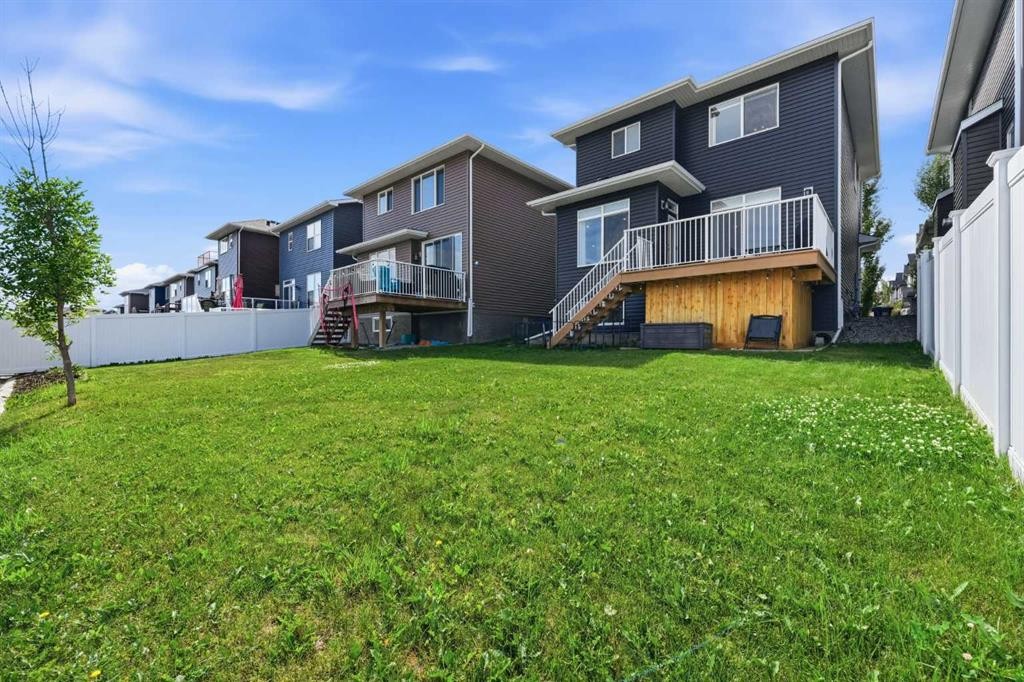 411 Rivercrest Boulevard, Cochrane, AB - Outdoor With Deck Patio Veranda