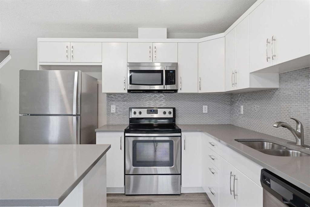 1449 Carrington Boulevard Nw, Calgary, AB - Indoor Photo Showing Kitchen With Stainless Steel Kitchen With Double Sink With Upgraded Kitchen