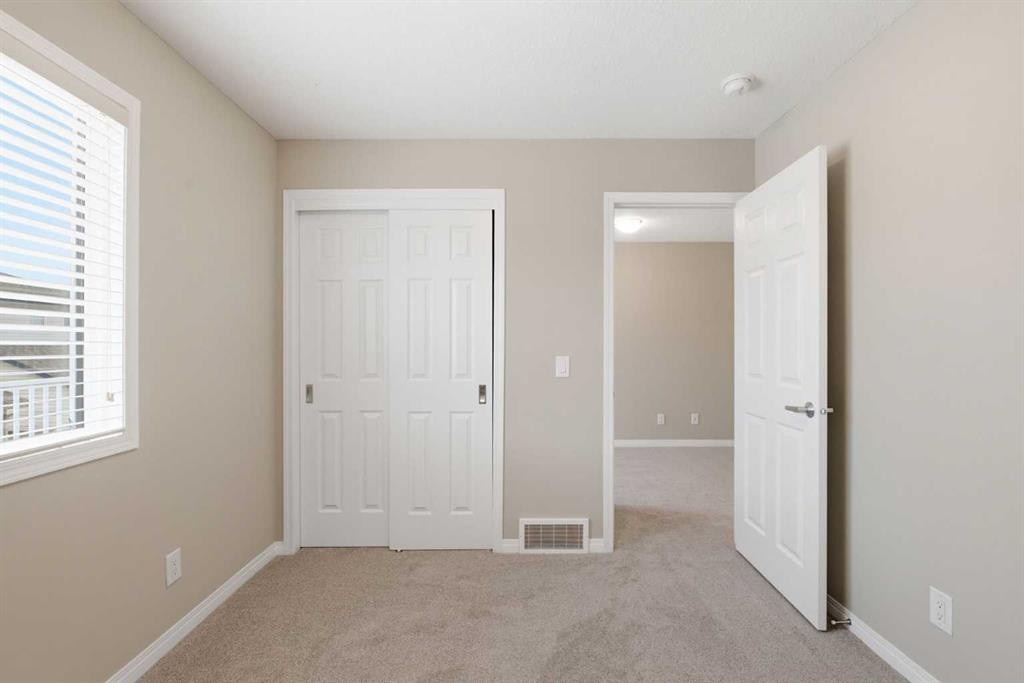 1449 Carrington Boulevard Nw, Calgary, AB - Indoor Photo Showing Other Room