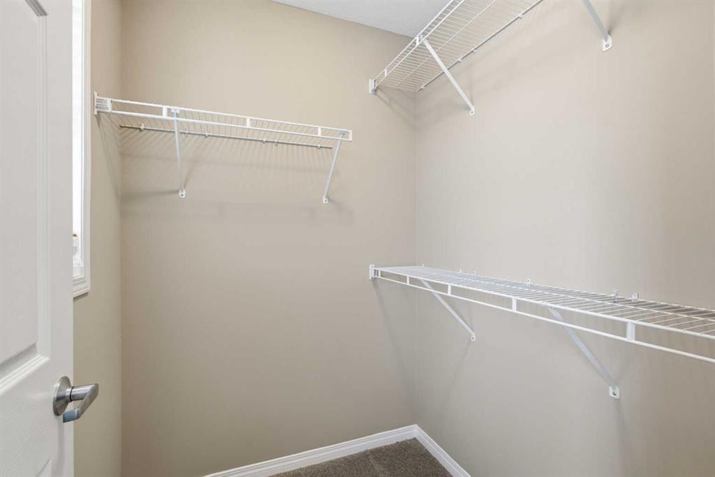 1449 Carrington Boulevard Nw, Calgary, AB - Indoor With Storage