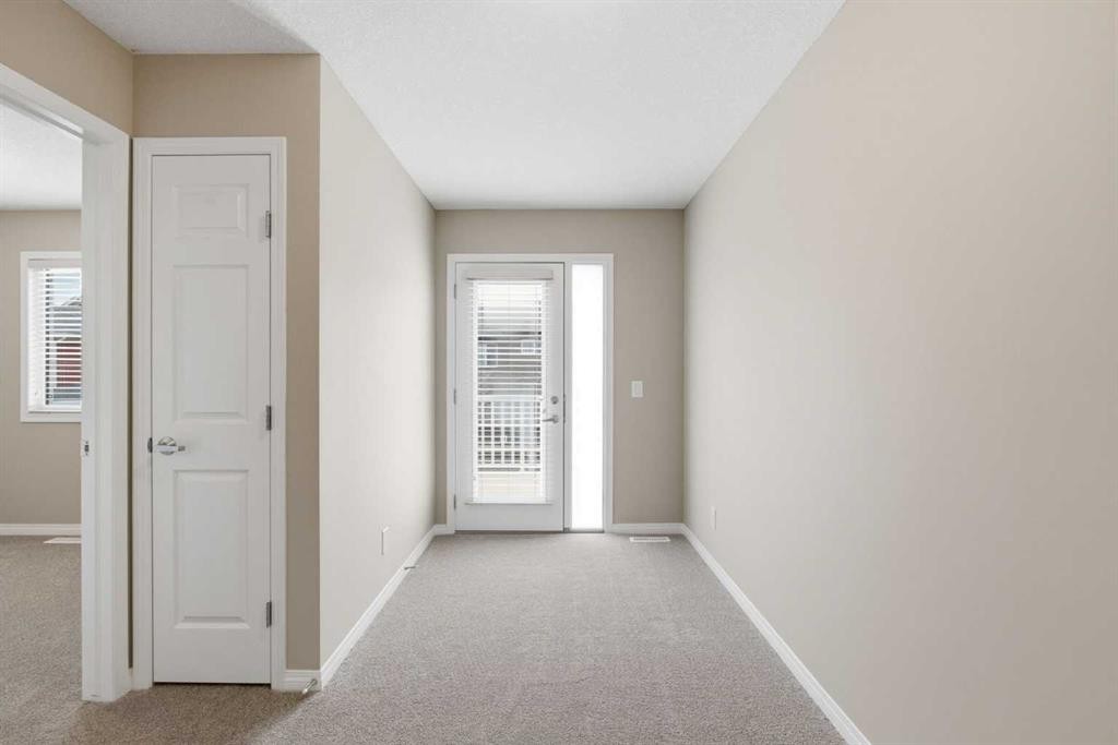 1449 Carrington Boulevard Nw, Calgary, AB - Indoor Photo Showing Other Room