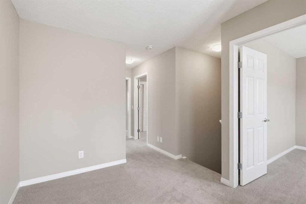 1449 Carrington Boulevard Nw, Calgary, AB - Indoor Photo Showing Other Room