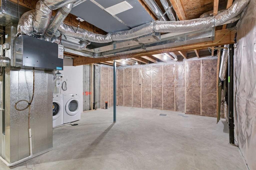 1449 Carrington Boulevard Nw, Calgary, AB - Indoor Photo Showing Basement