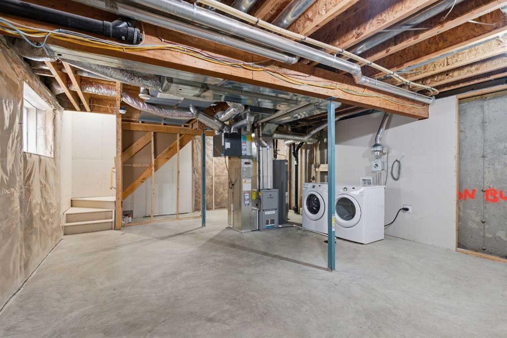 1449 Carrington Boulevard Nw, Calgary, AB - Indoor Photo Showing Basement