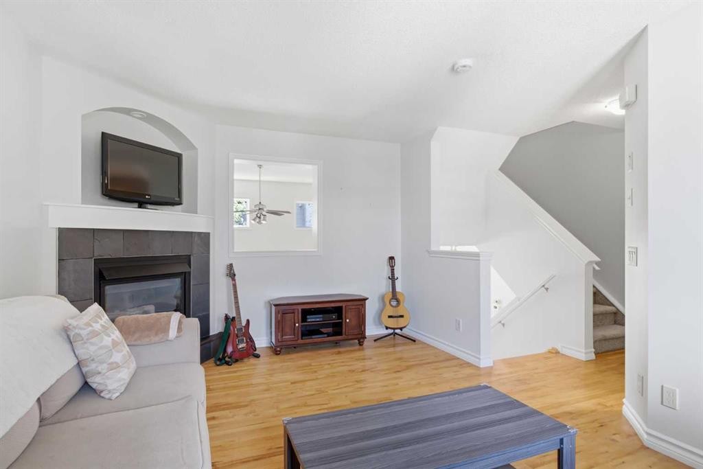 277 Inglewood Grove Se, Calgary, AB - Indoor Photo Showing Living Room With Fireplace