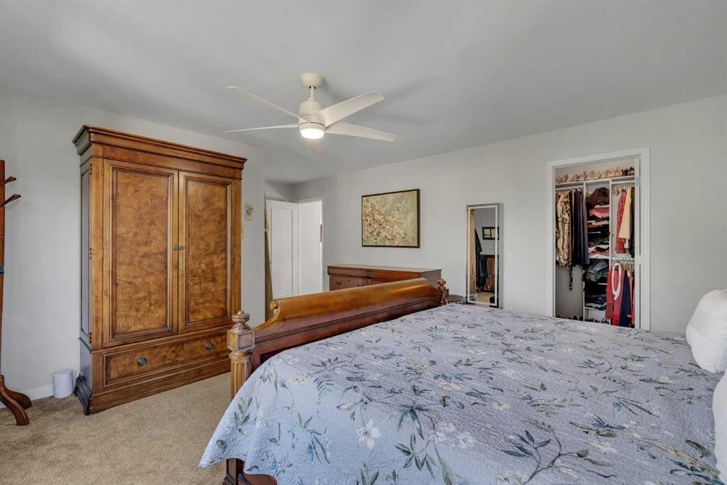 112 Hidden Vale Place Nw, Calgary, AB - Indoor Photo Showing Bedroom