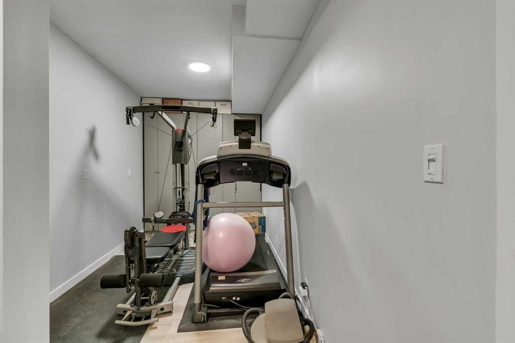 112 Hidden Vale Place Nw, Calgary, AB - Indoor Photo Showing Gym Room