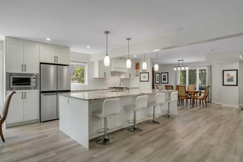 112 Hidden Vale Place Nw, Calgary, AB - Indoor Photo Showing Kitchen With Upgraded Kitchen