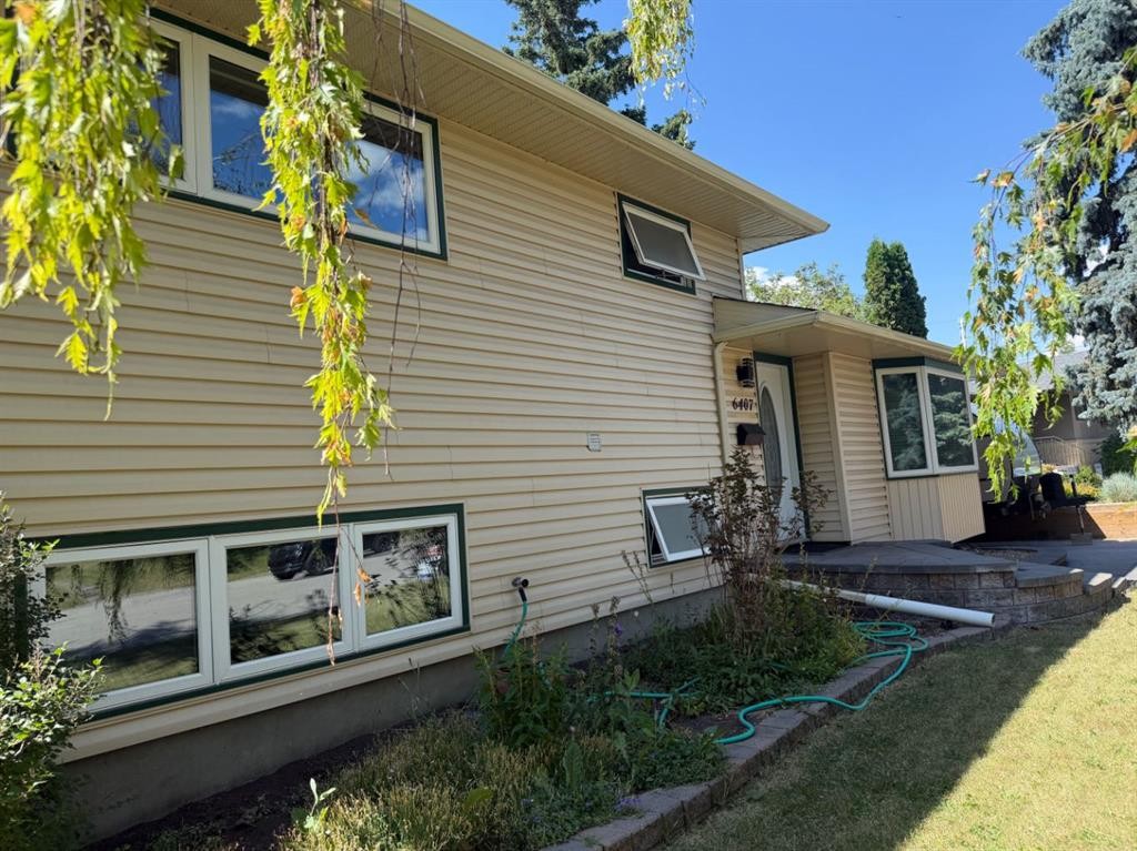 6407 Lombardy Crescent Sw, Calgary, AB - Outdoor With Deck Patio Veranda With Exterior