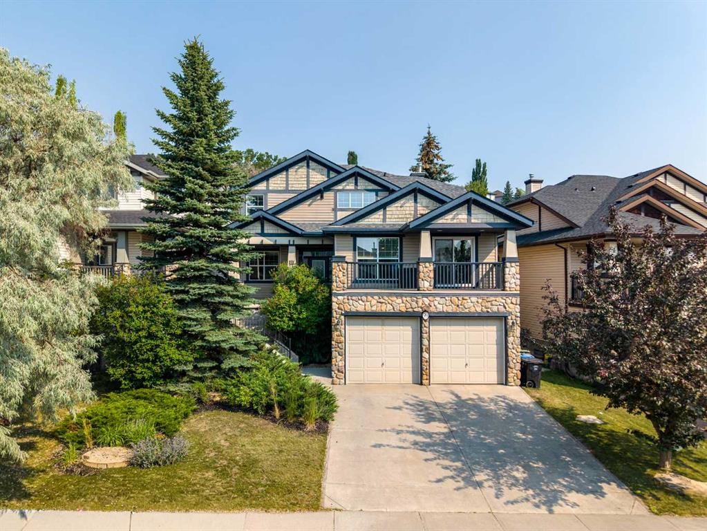 99 Springbluff Boulevard Sw, Calgary, AB - Outdoor With Facade