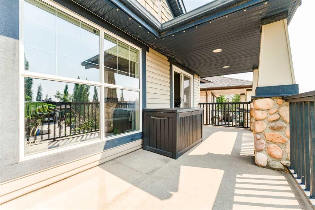 99 Springbluff Boulevard Sw, Calgary, AB - Outdoor With Deck Patio Veranda With Exterior