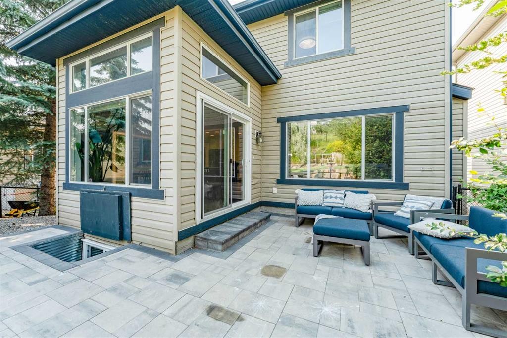99 Springbluff Boulevard Sw, Calgary, AB - Outdoor With Deck Patio Veranda With Exterior