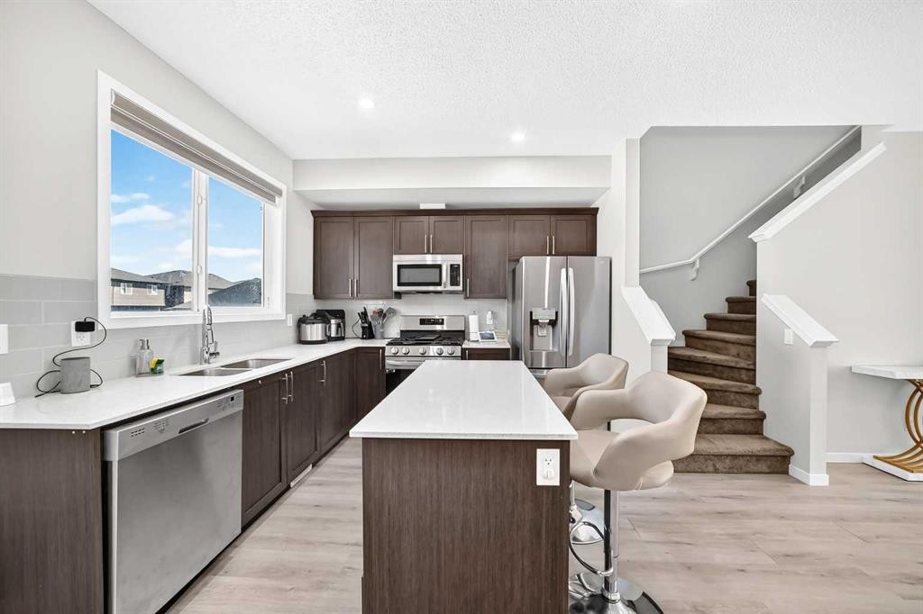 224 Corner Meadows Way, Calgary, AB - Indoor Photo Showing Kitchen With Double Sink With Upgraded Kitchen