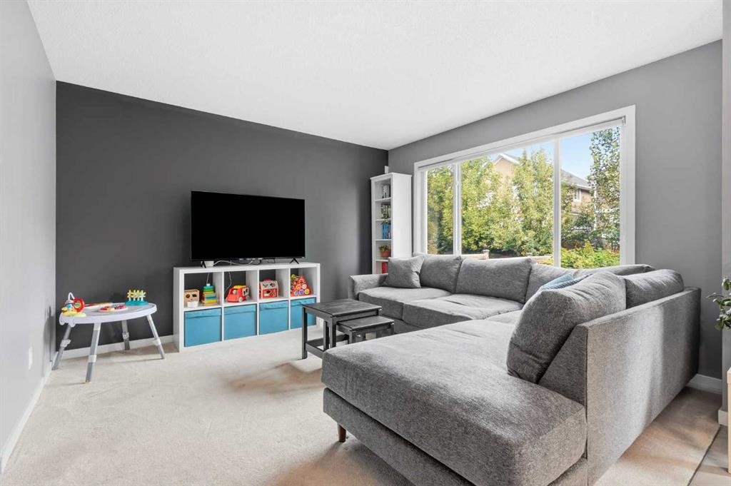 14 River Heights Crescent, Cochrane, AB - Indoor Photo Showing Living Room