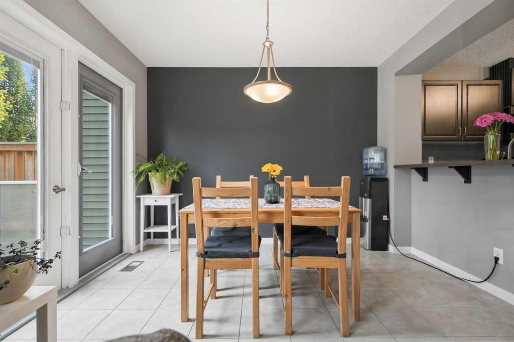 14 River Heights Crescent, Cochrane, AB - Indoor Photo Showing Dining Room