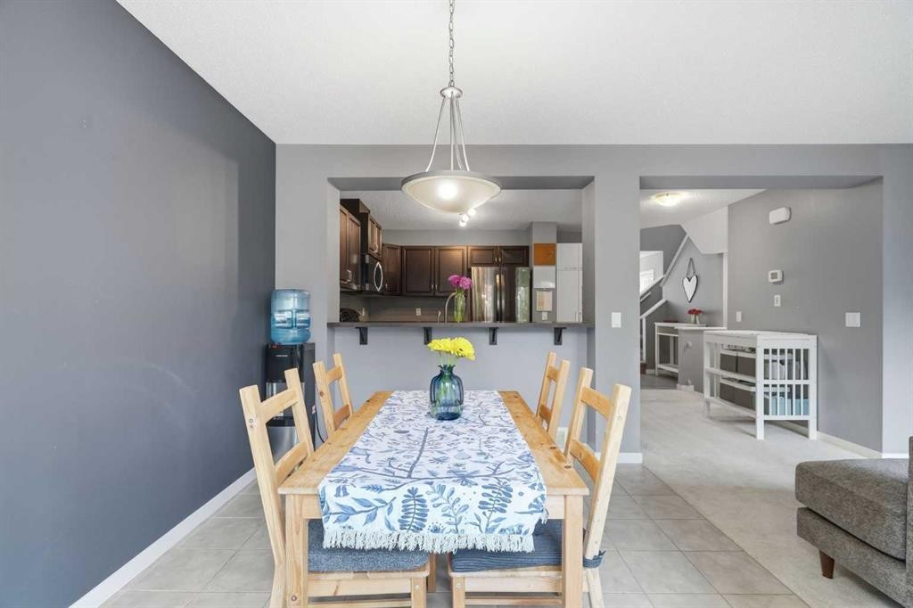 14 River Heights Crescent, Cochrane, AB - Indoor Photo Showing Dining Room