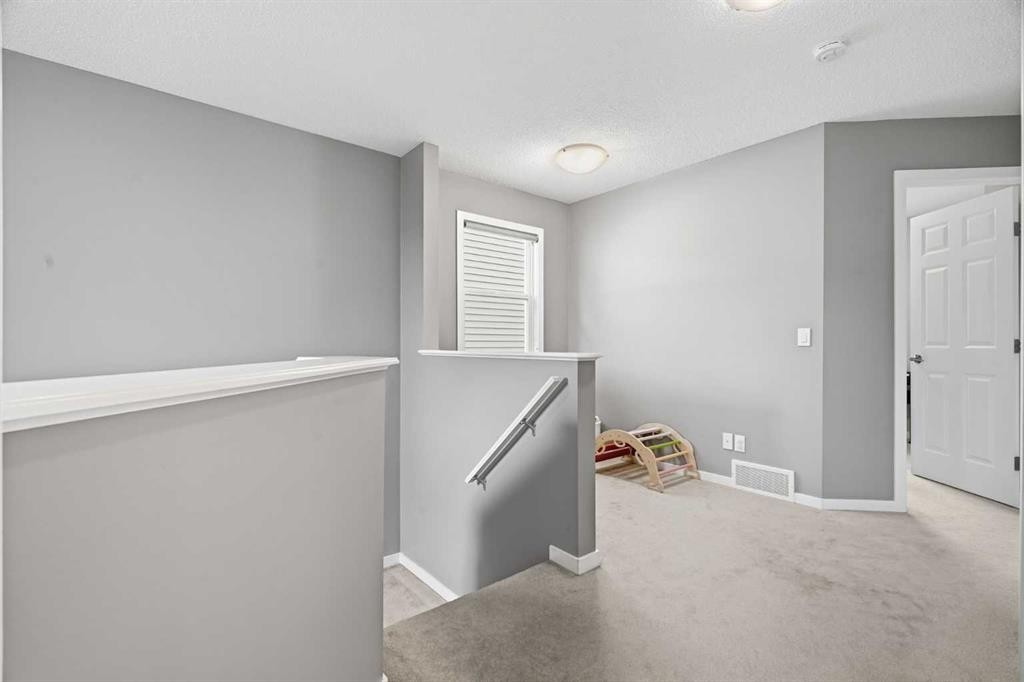 14 River Heights Crescent, Cochrane, AB - Indoor Photo Showing Other Room
