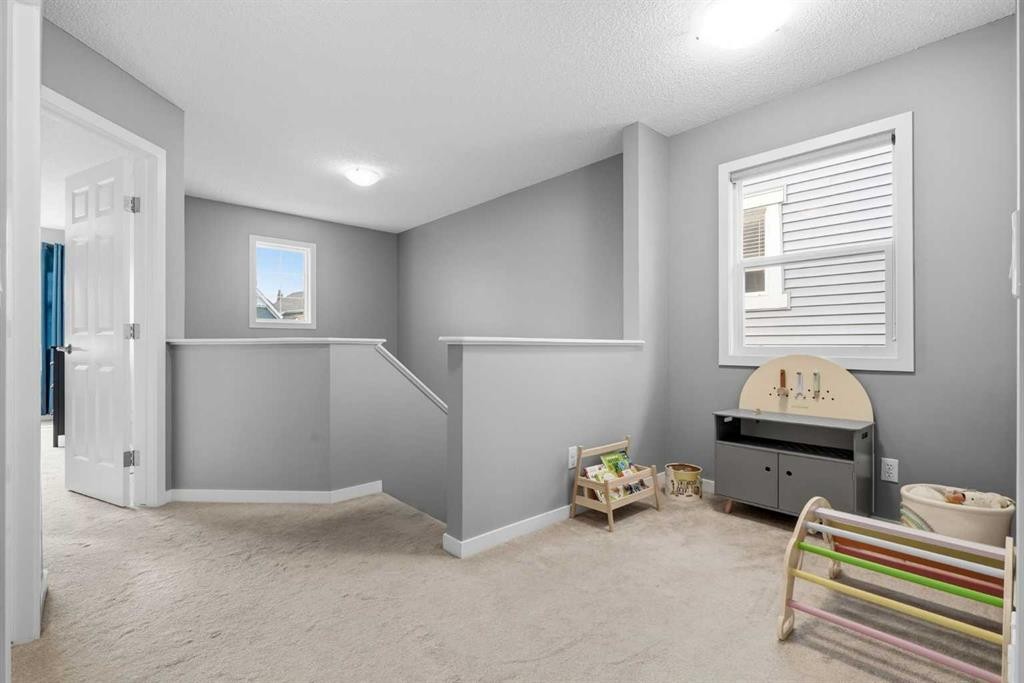 14 River Heights Crescent, Cochrane, AB - Indoor Photo Showing Other Room